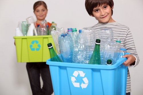 Happy business owners overseeing clean premises